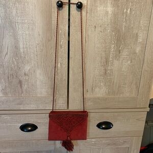 Handcrafted Red Suede Crossbody Bag with Tassel Detail